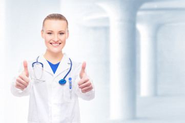 A happy intern in university with thumbs up