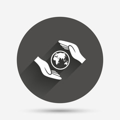 Worldwide insurance sign. Hands protect cover.