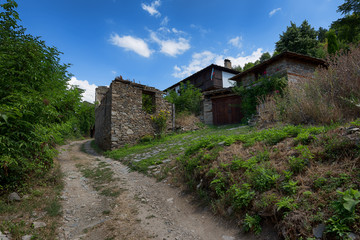 Fototapeta na wymiar Summer time along the streets of Leshten village, Bulgaria