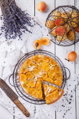 Pie with apricots.Homemade cakes,with lavender on a white background.