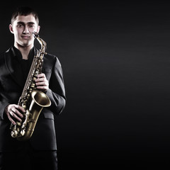 Obraz premium Saxophonist Saxophone Player jazz man
