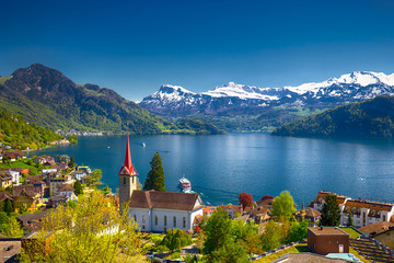 Village Weggis, lake Lucerne (Vierwaldstattersee), Pilatus mountain and Swiss Alps in the...