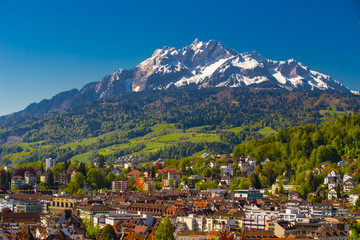 Fototapeta na wymiar View to Pilatus mountain and historic city center of Luzern, Switzerland.