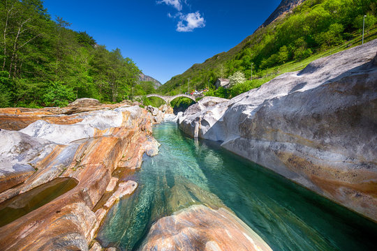 Double arch stone bridge at Ponte dei Salti with waterfall, Lavertezzo, Verzascatal, Canton Tessin.