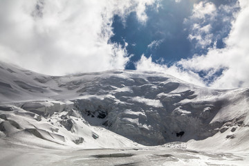 Ice, snow, sky and mountains at Pamir