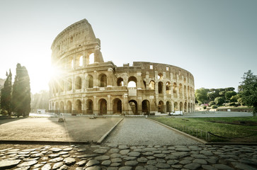 Plakat Colosseum in Rome and morning sun, Italy