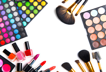 Makeup set palettes with colorful eyeshadows. Various cosmetic brushes