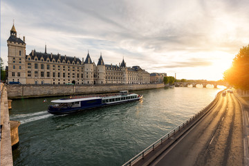 Boat tour on Seine river in Paris with sunset. Paris, France - obrazy, fototapety, plakaty