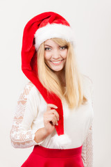 Happy cute woman in santa helper hat. Christmas.