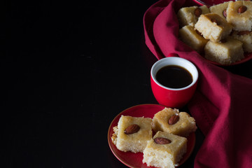 Basbousa and Coffee with Dark Background Horizontal with Copy Space from Above