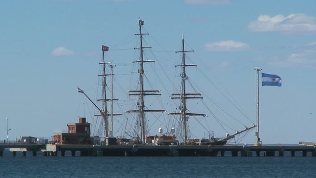 Harbor Puerto Madryn with the sail ship Amsterdam