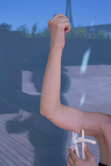 Woman measuring body contouring