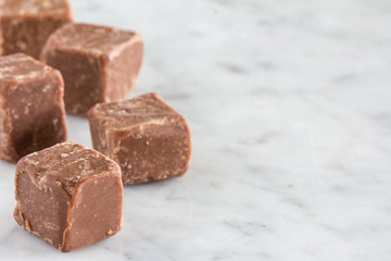 Chocolate Fudge on Marble Surface with Copy Space Right