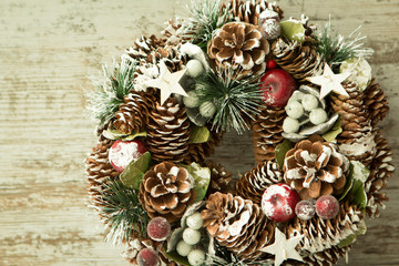 Delicate Christmas wreath of pine cones