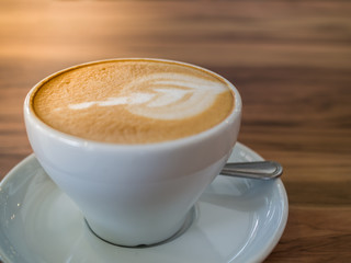 Coffee cup on a wooden table