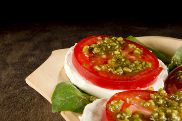 Caprese salad with mozzarella cheese tomatoes and basil