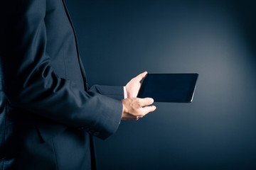 Naklejka premium Businessman Use Tablet on Isolated Background
