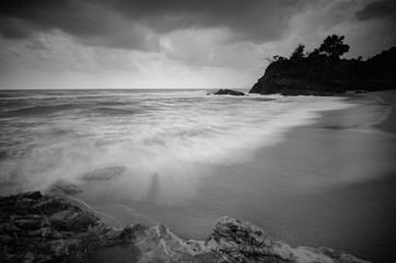 black and white image,stunning tropical wave flow hitting the sa - 120922853