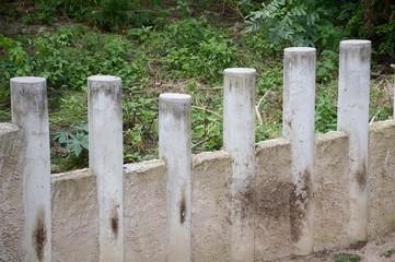 cement post in nature garden