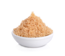 Bowl of white sugar isolated on white background