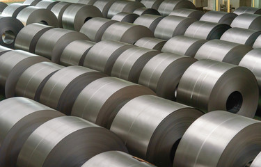 Cold rolled steel coil at storage area in steel industry plant. - obrazy, fototapety, plakaty