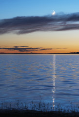 Fototapeta na wymiar Dawn above a lake