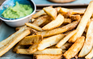 Golden French fries potatoes ready to be eaten