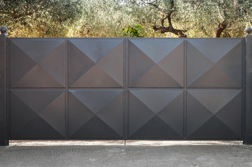Black metal gate with square pattern