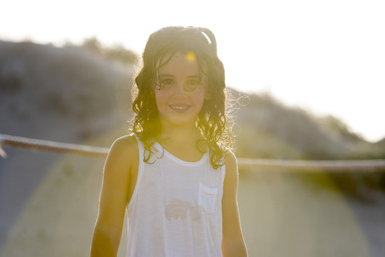 Happy little girl in sunlight