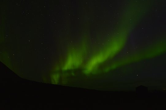 Green northern light at the most west point of the Iceland