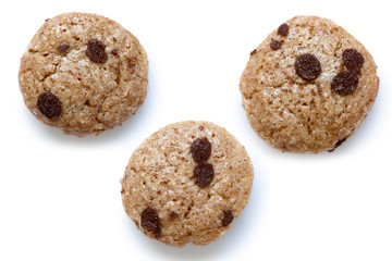 Three single chocolate chip cookies cereal isolated on white.