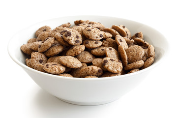 Bowl of chocolate chip cookies cereal isolated on white. - obrazy, fototapety, plakaty