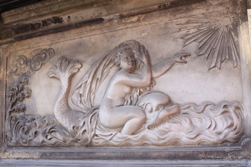 Gdansk - decorated with reliefs entrance to the historic buildings on the street  of Holy Spirit
