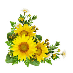 Sunflowers and wild flowers in a corner arrangement