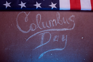 The text on the Board and an American flag,