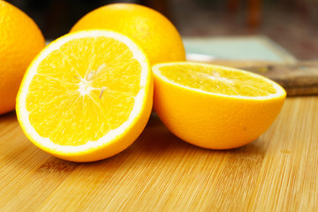 Fresh oranges on Chopping Wood