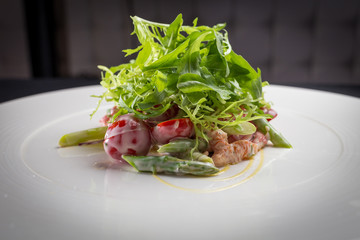salad with arugula on white plate