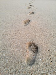 Interesting feature of footprints in the sand on a beach on Ko Lanta island, Krabi, southern Thailand.