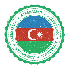 Grunge rubber stamp with Azerbaijan flag. Vintage travel stamp with circular text, stars and national flag inside it. Vector illustration.