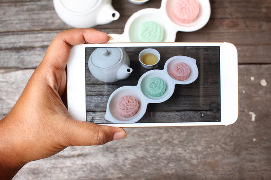 Taking a photo of mochi japanese dessert with smart phone