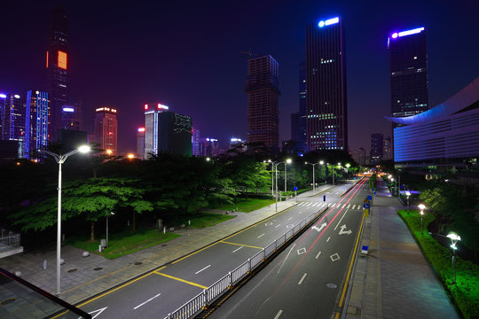 Empty road surface floor with modern city landmark architecture