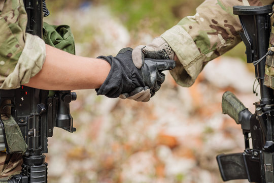 Soldier shaking hands on outdoor