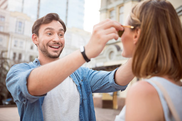 Funny young couple having a walk
