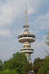 Fototapeta na wymiar Thessaloniki, Greece - September 12 2016: OTE telecommunications tower south view. This 1966 tower stands 76 meters high from the ground. The top floor rotates, offering a city panorama.