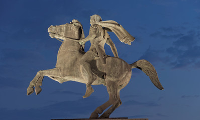 Thessaloniki, Greece - September 12 2016: Alexander The Great statue at night. This six meters tall monument at Thessaloniki coastline faces east.