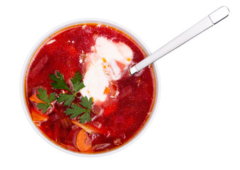 Hot borsch in a white bowl isolated on a white