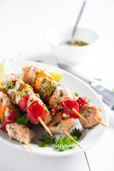 Skewer from chicken and peppers