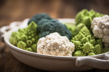 cauliflower and broccoli in rustic bowl