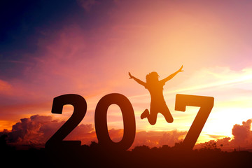 Silhouette young woman jumping to 2017  new year