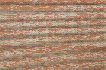 Red and orange brick wall with variance. Ideal for texture or background image.
